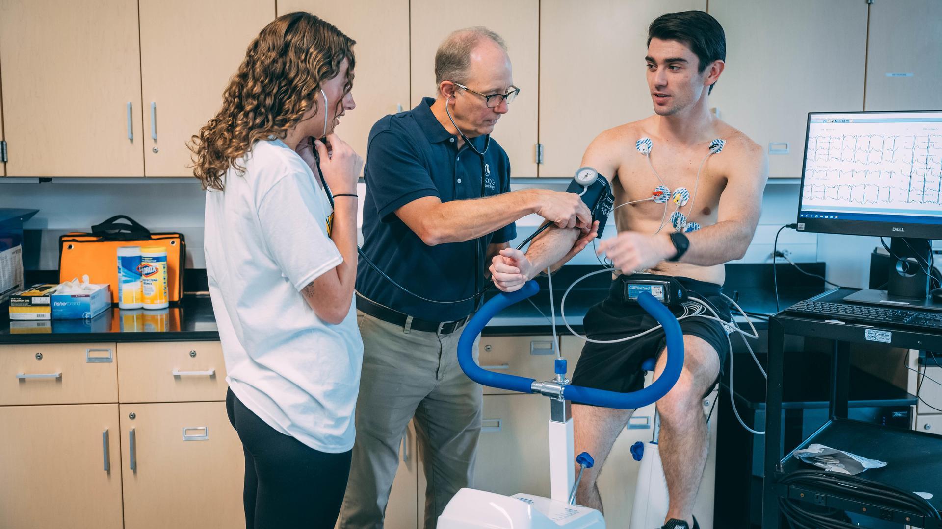 Dr. Paul Davis and his students conduct research for the clinical exercise physiology program